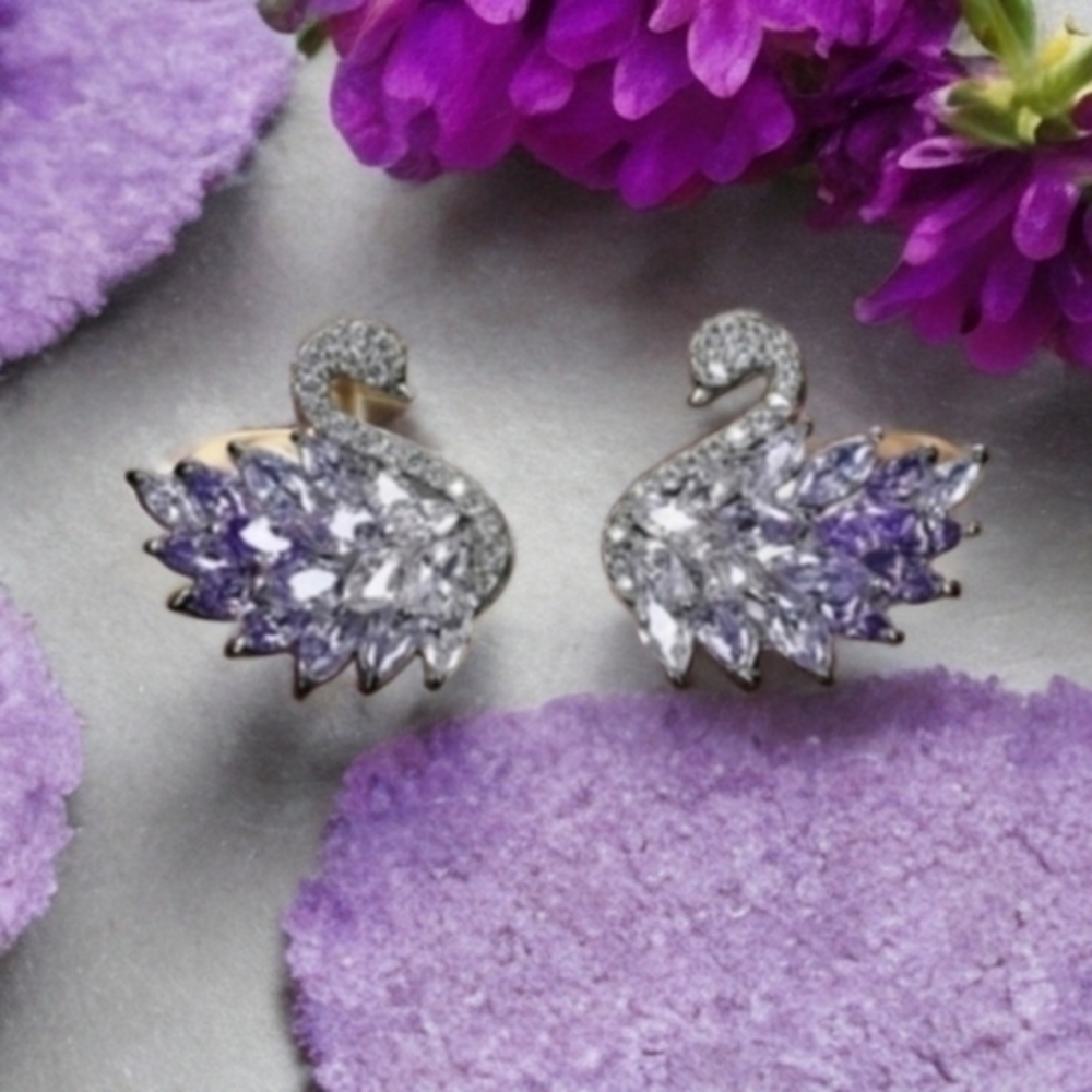 ANTHROPOLOGIE CRYSTAL SWAN GRADIENT STUD EARRINGS (1)